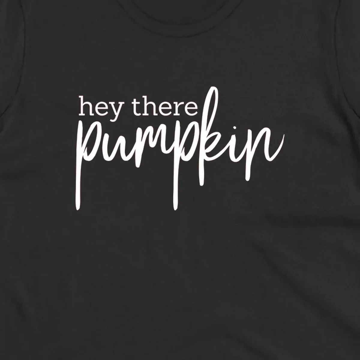 White text design with "hey there" in block font and "pumpkin" in script font, on a black background.