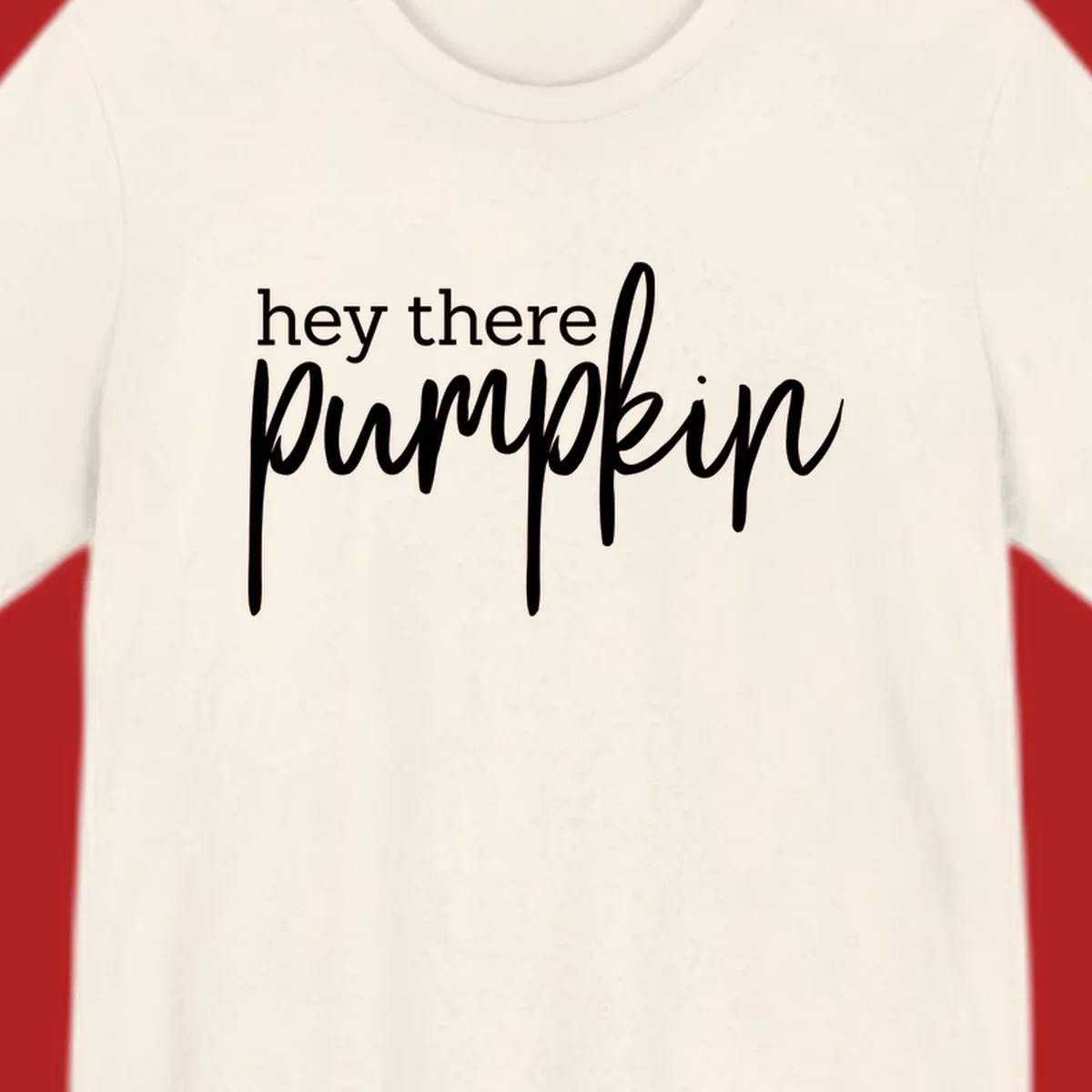 White text design with "hey there" in block font and "pumpkin" in script font, on a black background.