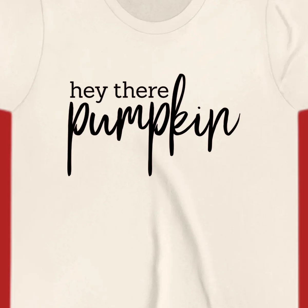White text design with "hey there" in block font and "pumpkin" in script font, on a black background.