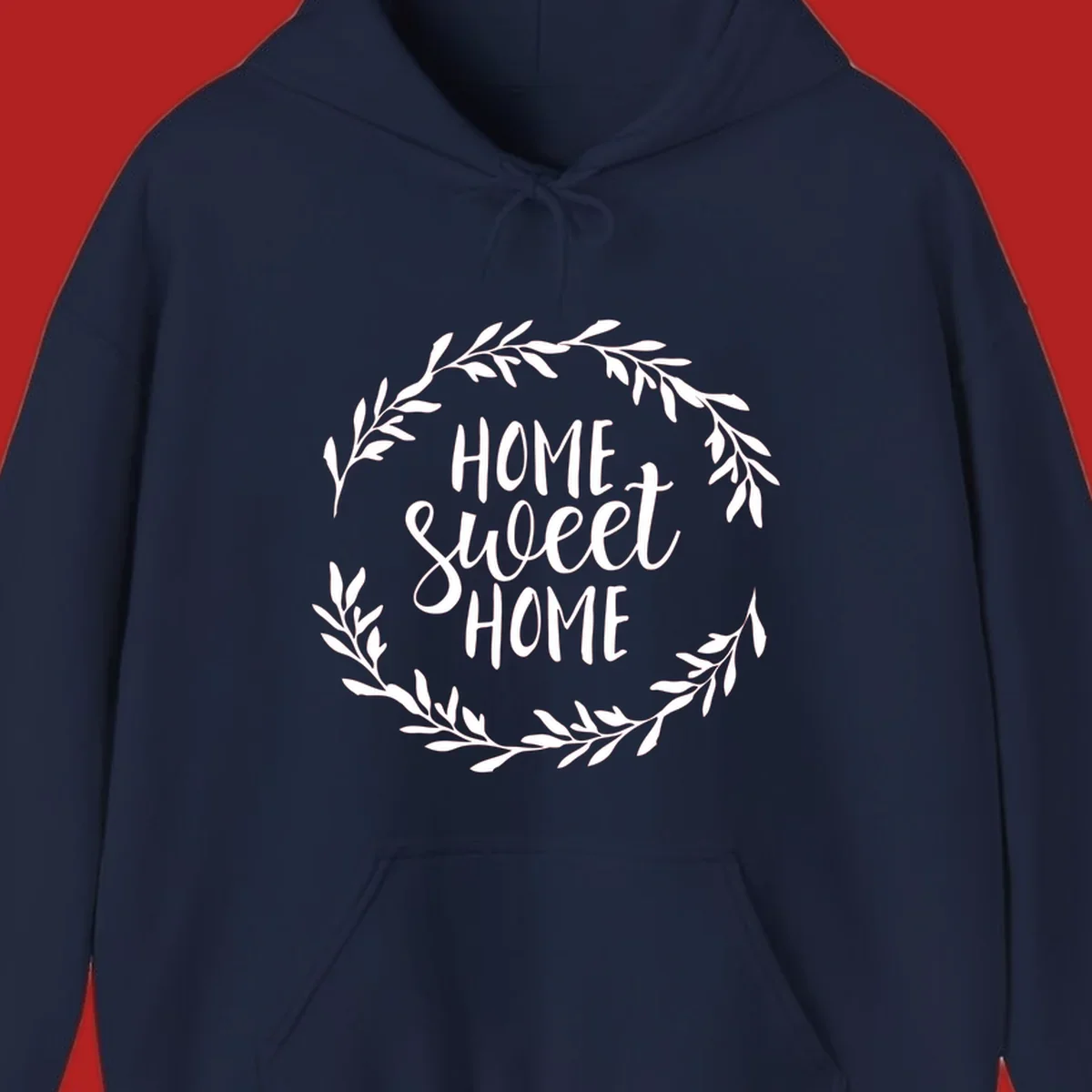 White 'Home Sweet Home' text with a floral wreath on a dark background.