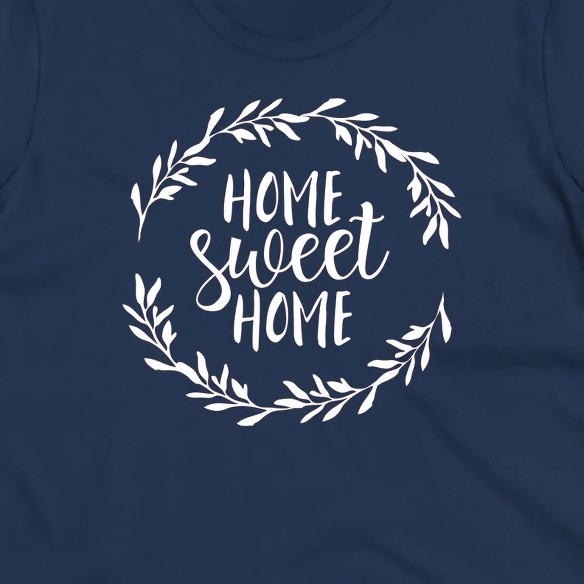 White 'Home Sweet Home' text with a floral wreath on a dark background.