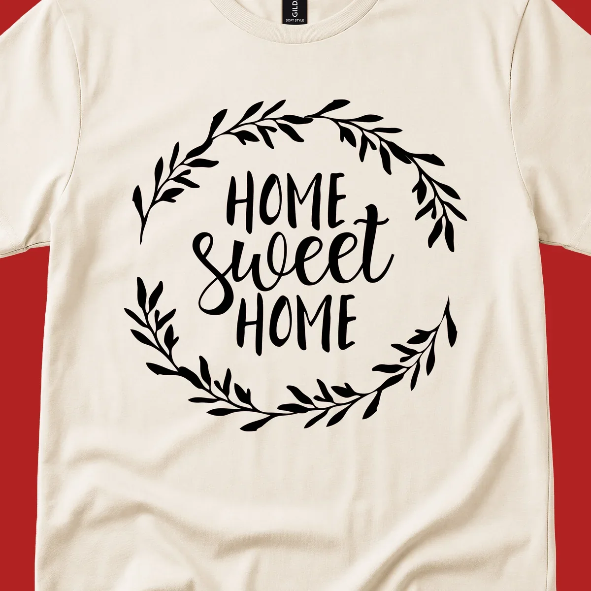White 'Home Sweet Home' text with a floral wreath on a dark background.
