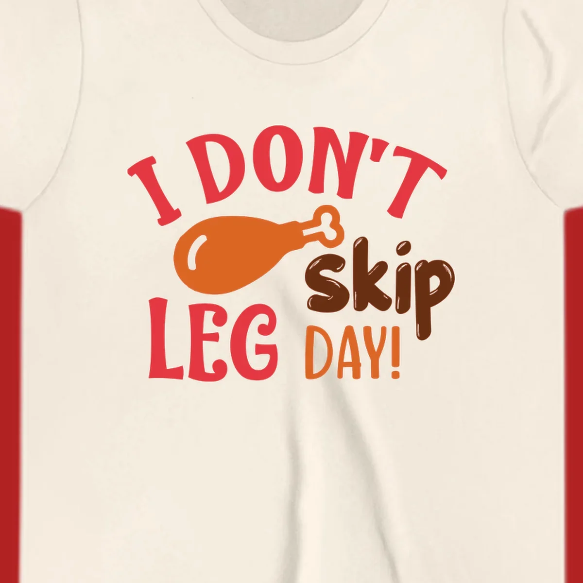 I Don't Skip Leg Day turkey drumstick graphic tee shirt with text.