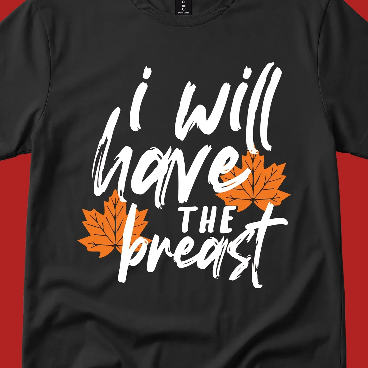 Thanksgiving pun design with text "i will have THE breast" and orange maple leaves.