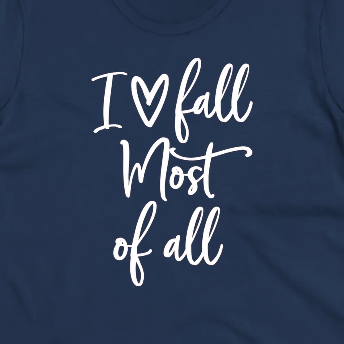 Hand-drawn script text 'I ♡ fall Most of all' in white on a black background.