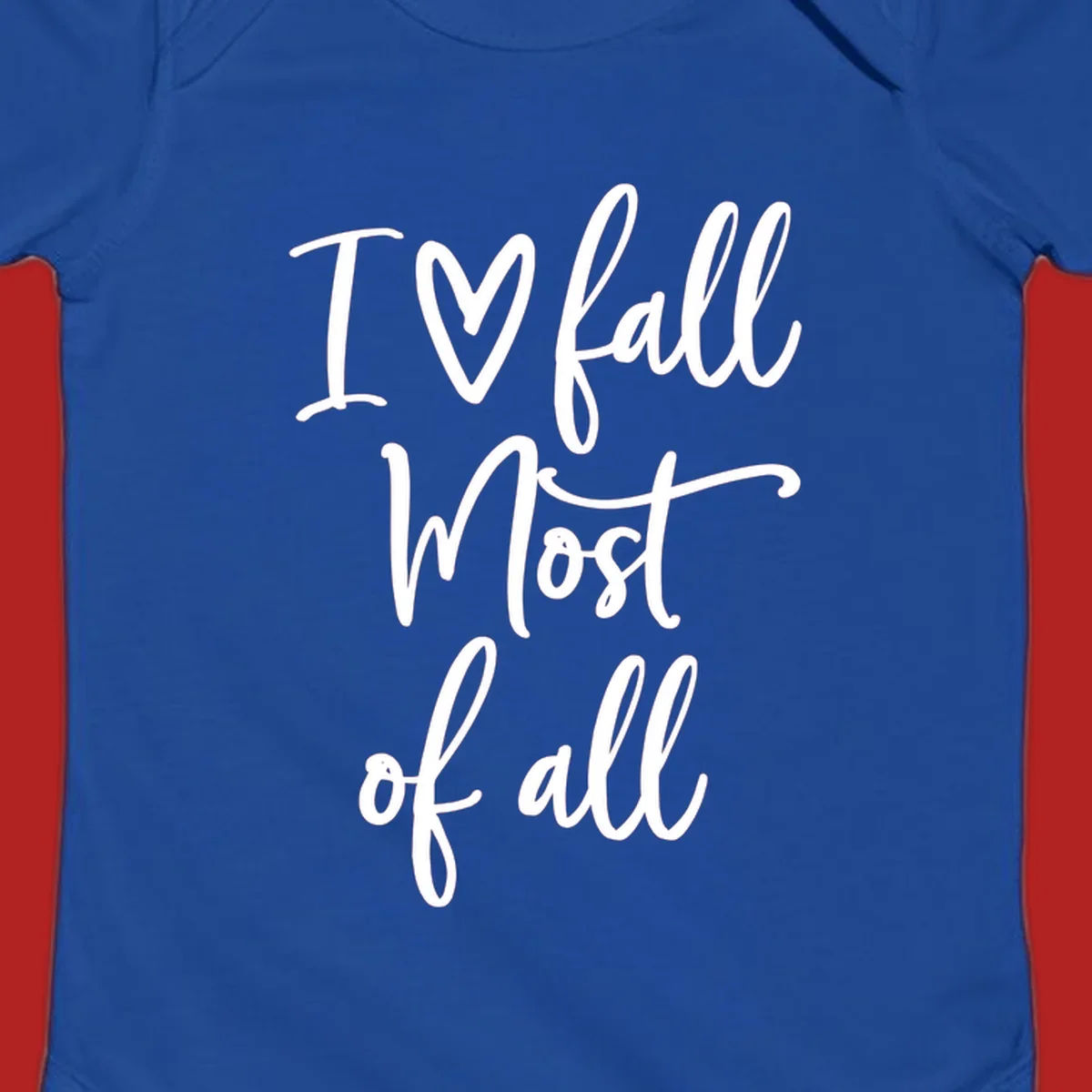 Hand-drawn script text 'I ♡ fall Most of all' in white on a black background.
