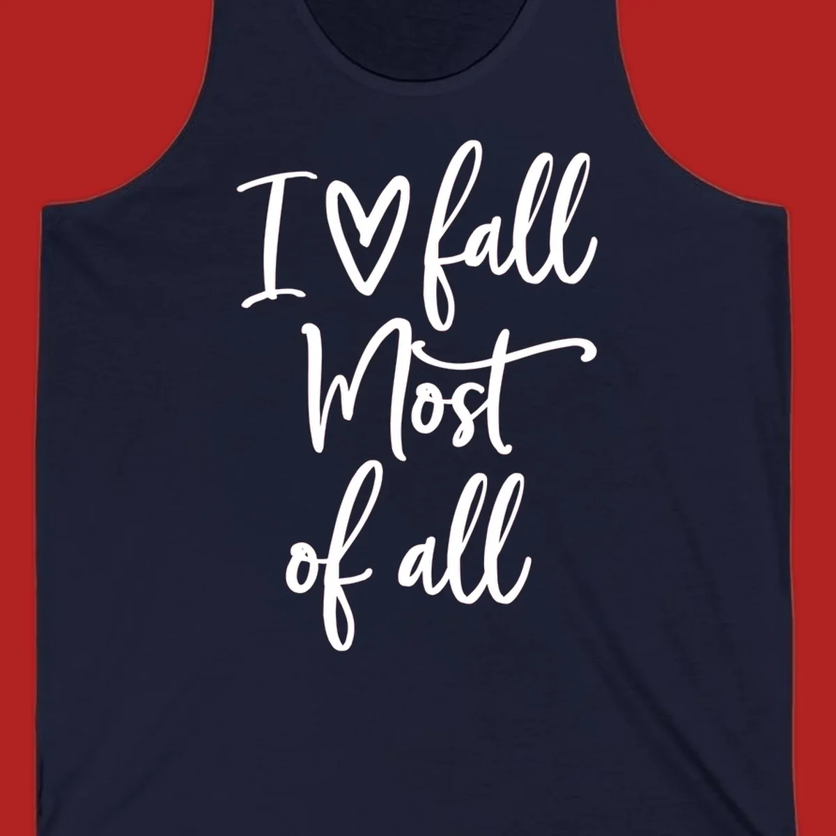 Hand-drawn script text 'I ♡ fall Most of all' in white on a black background.