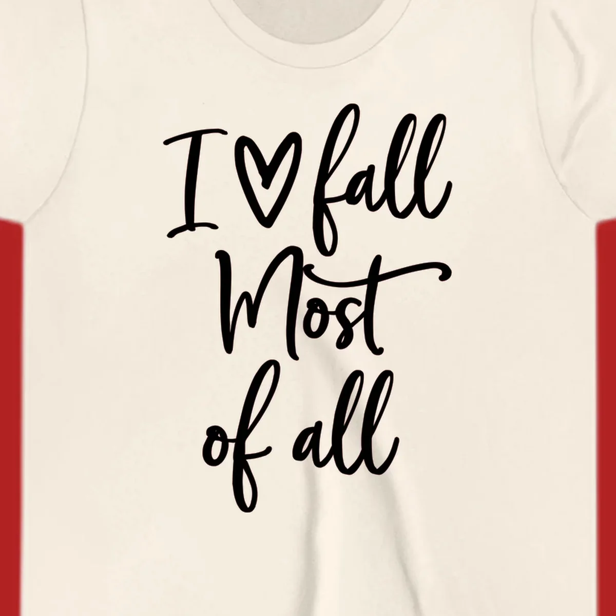 Hand-drawn script text 'I ♡ fall Most of all' in white on a black background.