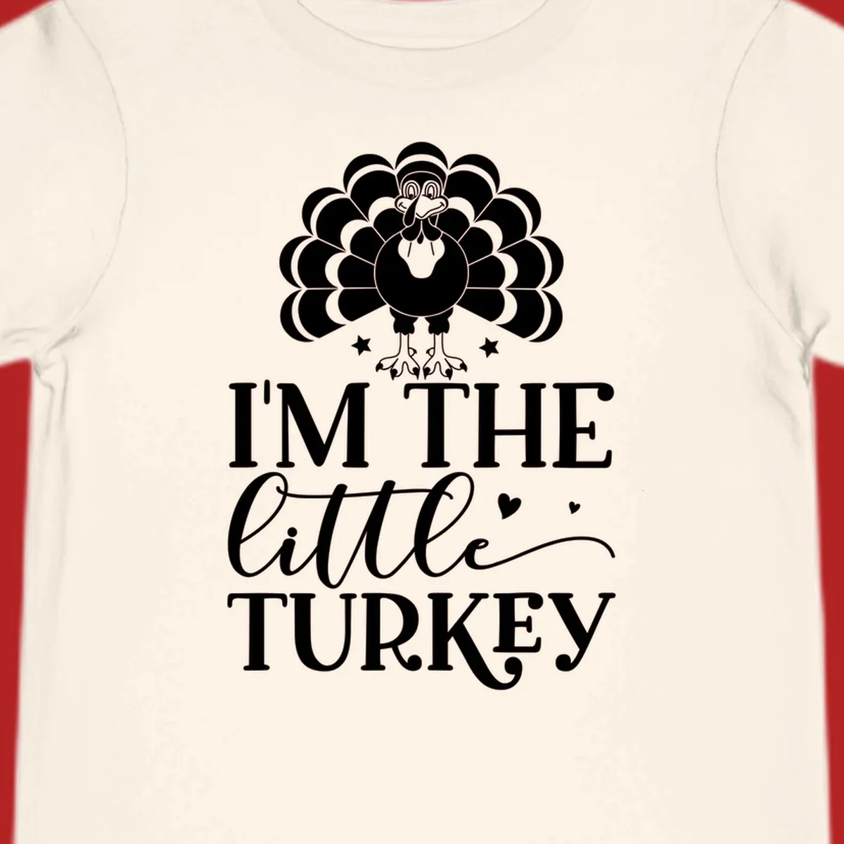 Illustration of a turkey with text 'I'M THE Little TURKEY', for Thanksgiving.