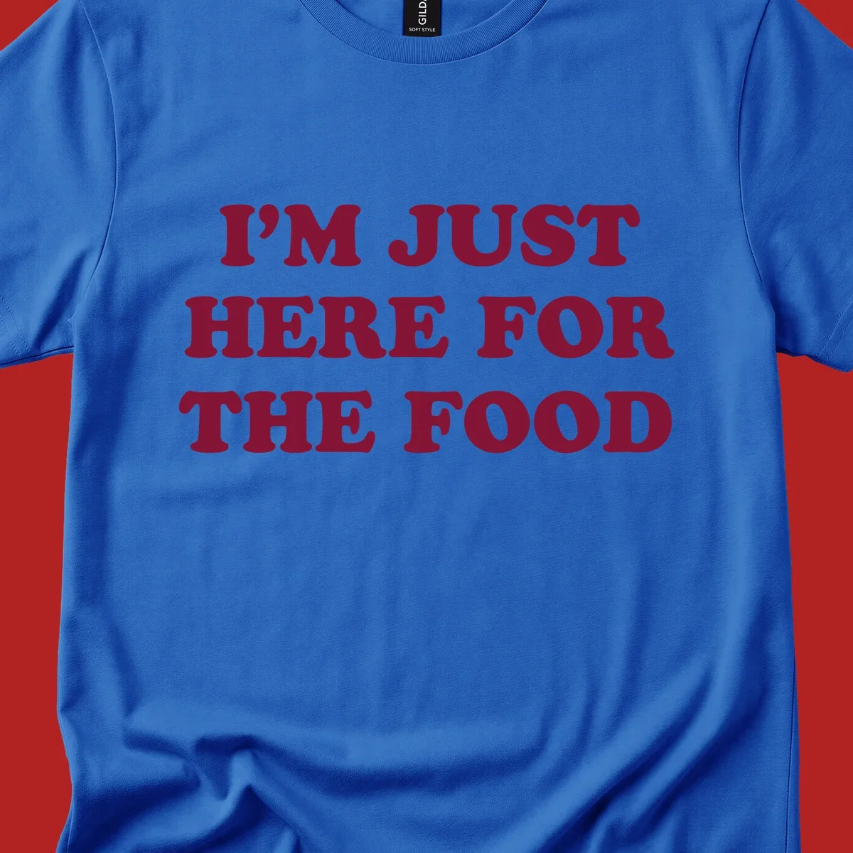 I'm Just Here For The Food text design in maroon.