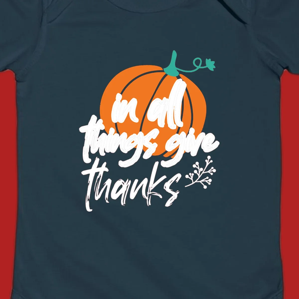 Thanksgiving pumpkin with 'in all things give thanks' text, autumn holiday design.