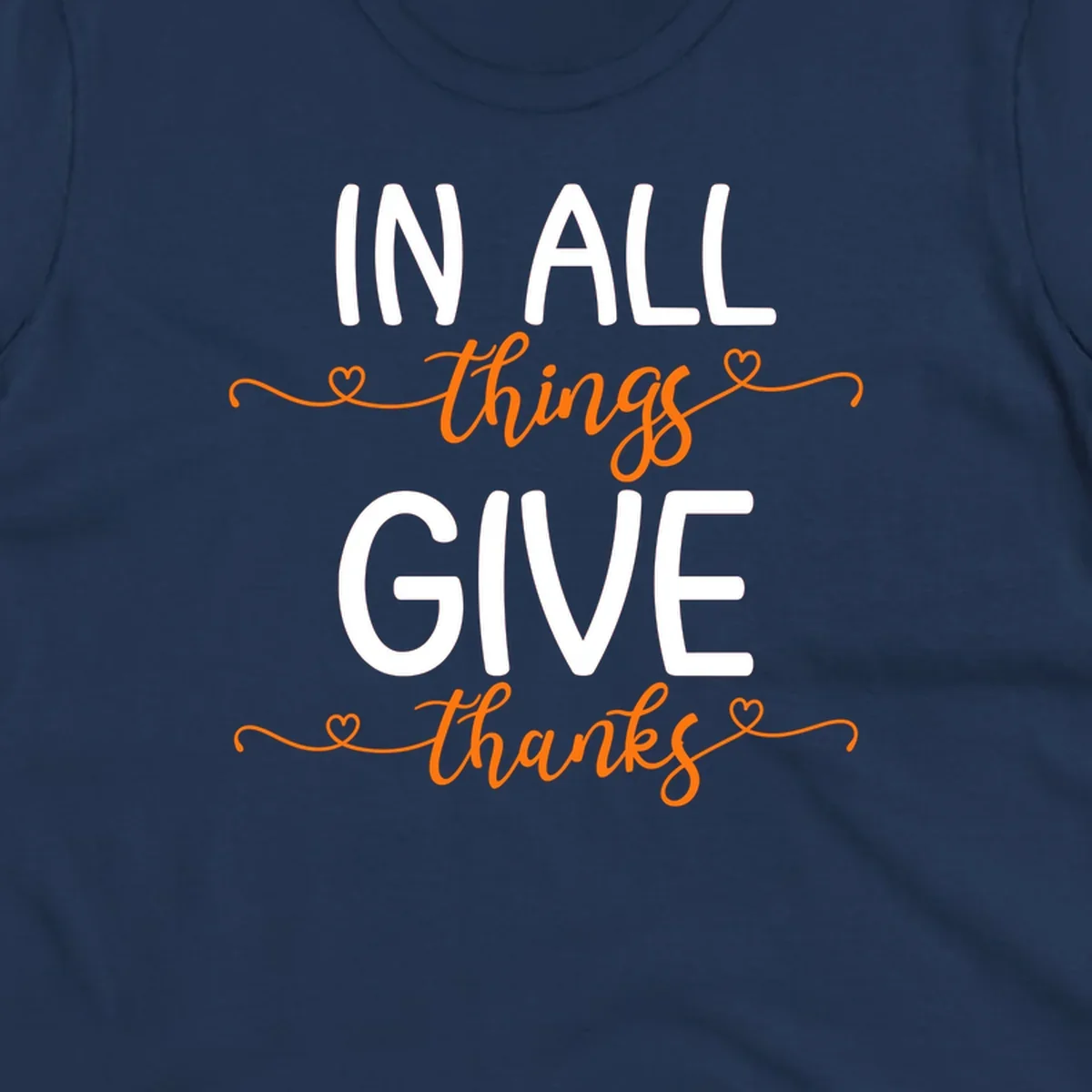 In all things give thanks phrase with script font and heart accents.