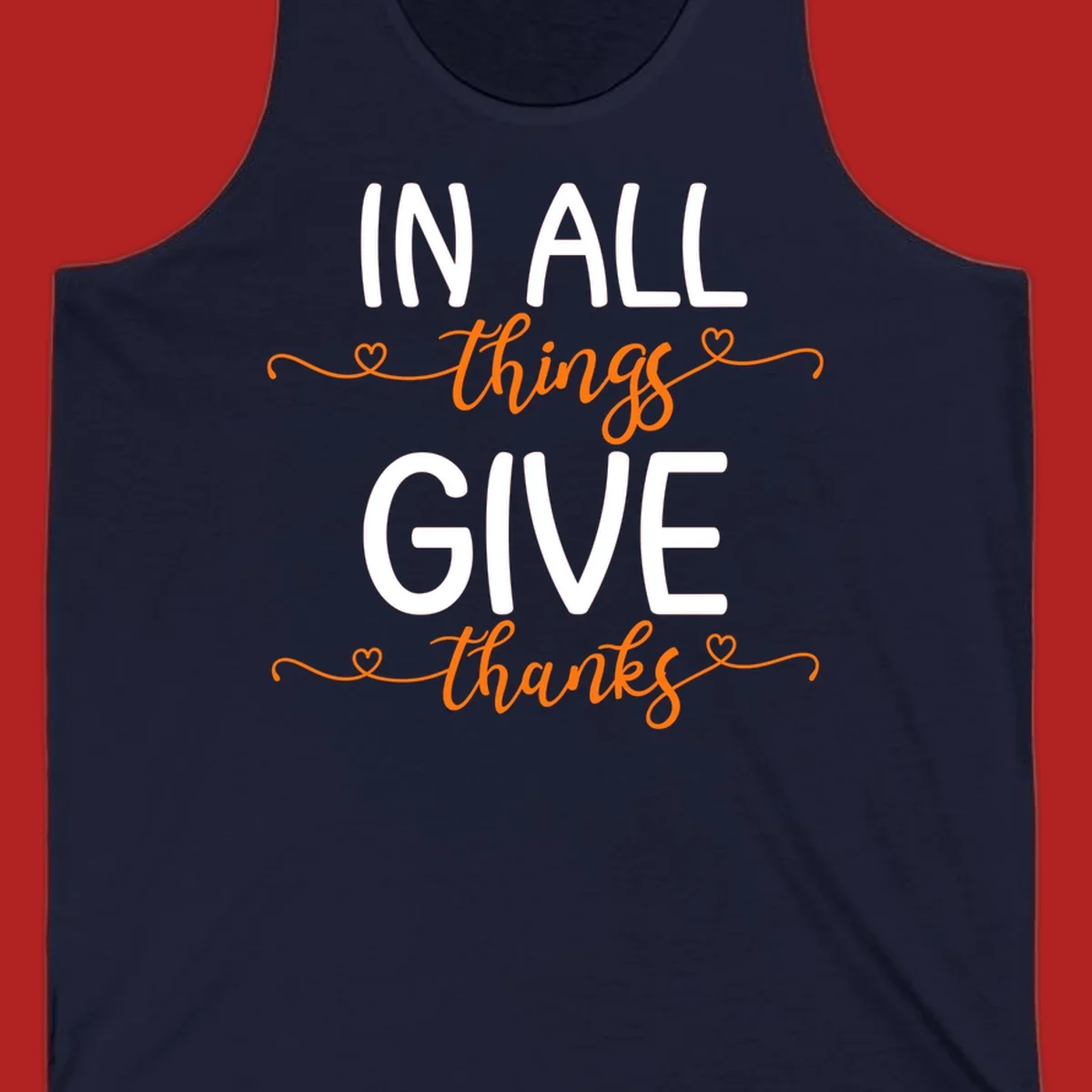 In all things give thanks phrase with script font and heart accents.