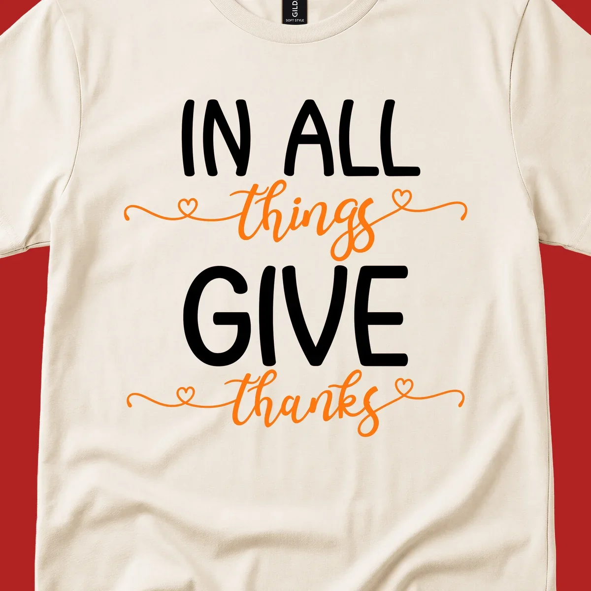 In all things give thanks phrase with script font and heart accents.