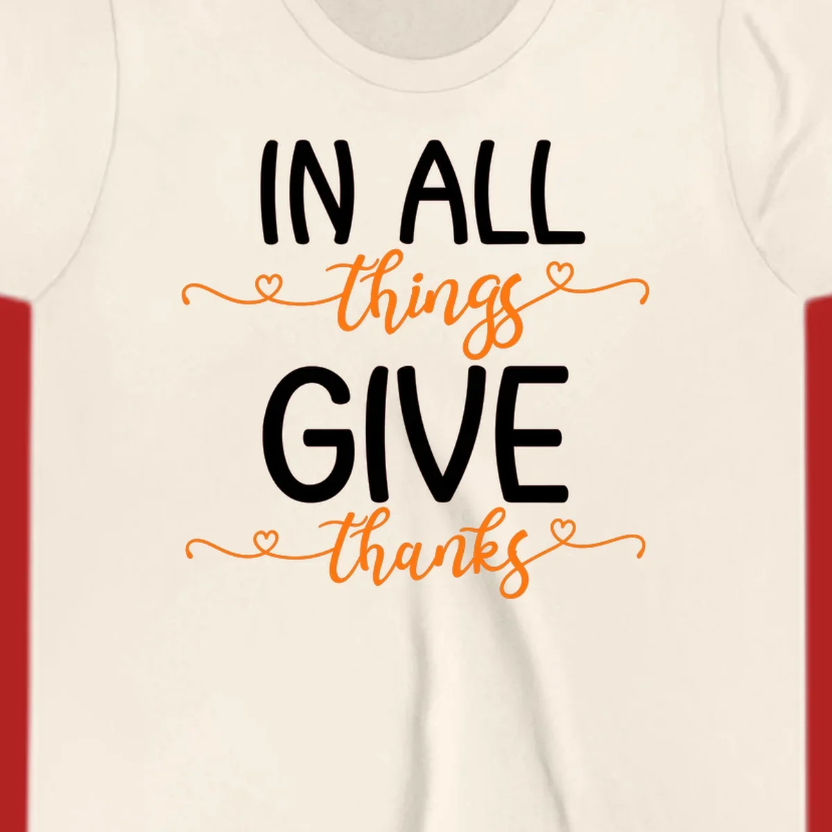 In all things give thanks phrase with script font and heart accents.
