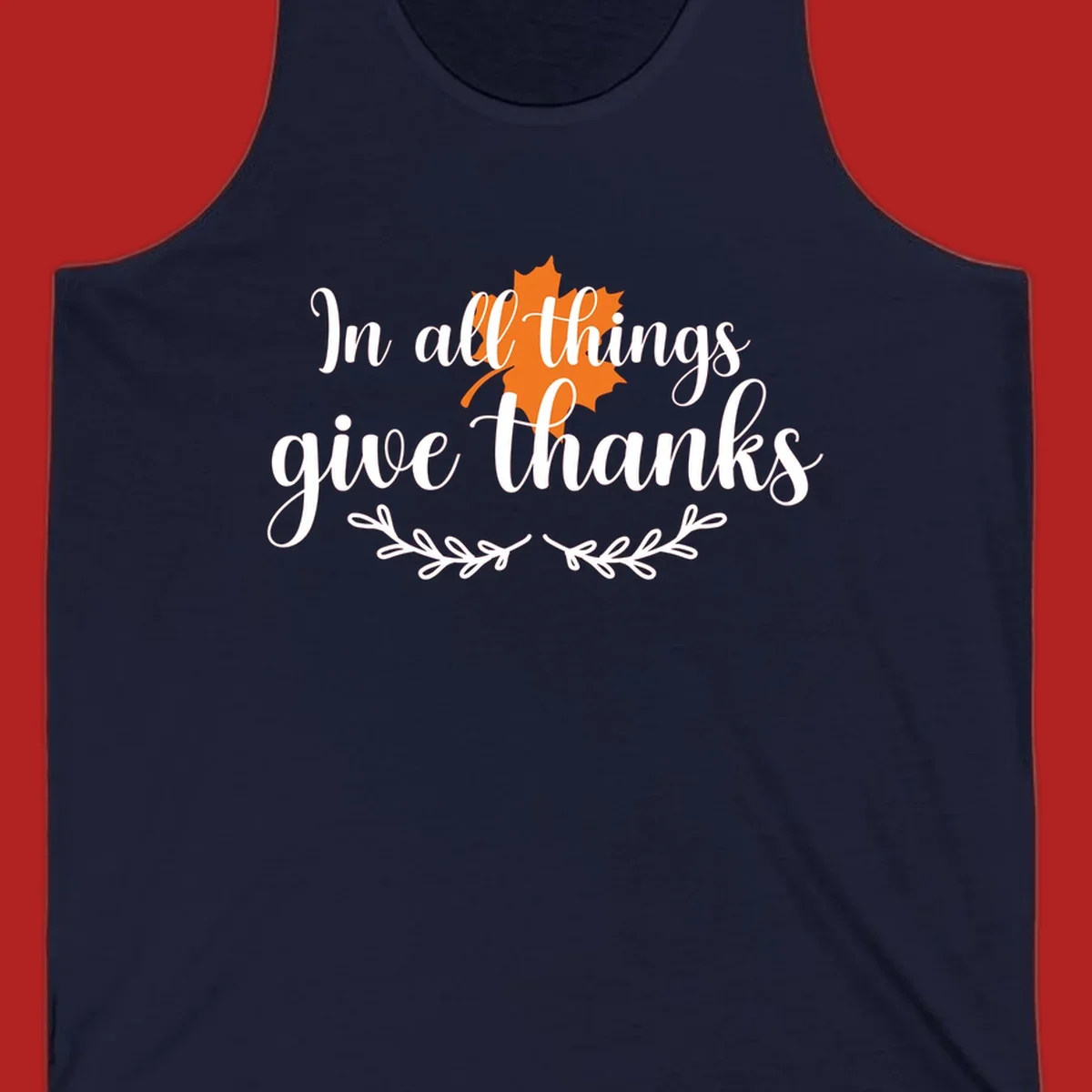 Thanksgiving typography with orange maple leaf and 'In all things give thanks' text.