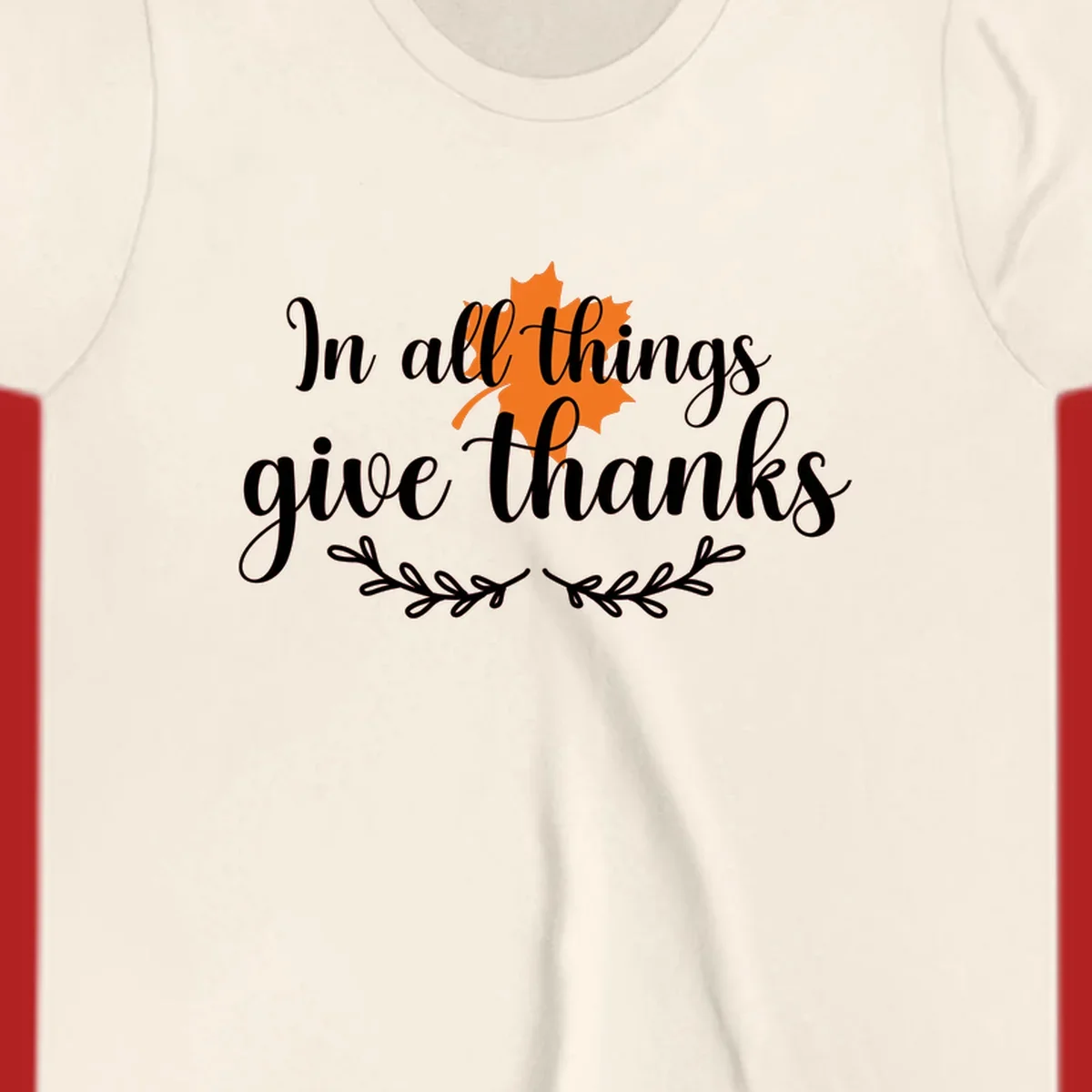 Thanksgiving typography with orange maple leaf and 'In all things give thanks' text.