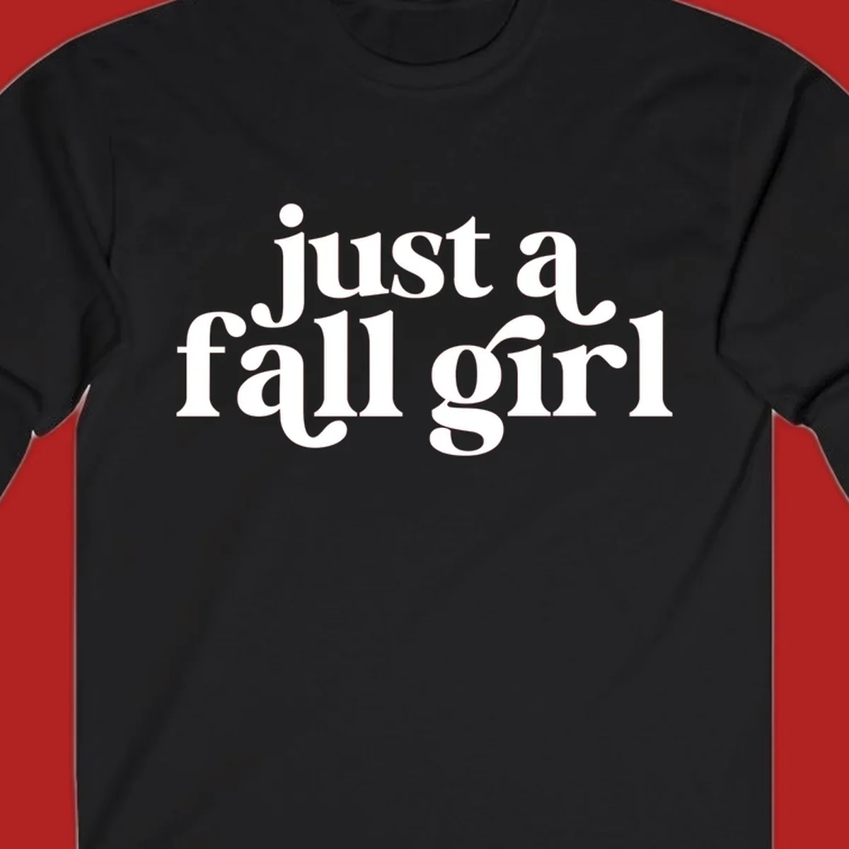 Just a Fall Girl typography design in white.