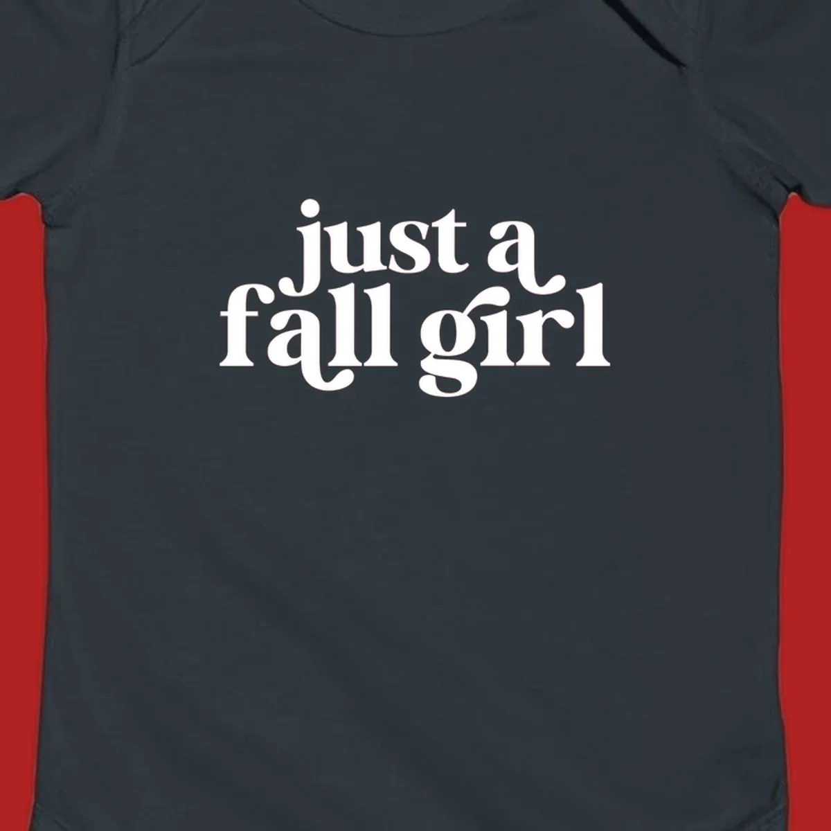 Just a Fall Girl typography design in white.