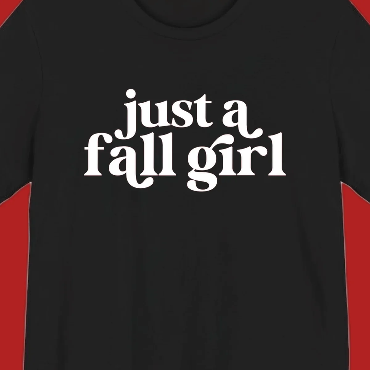 Just a Fall Girl typography design in white.