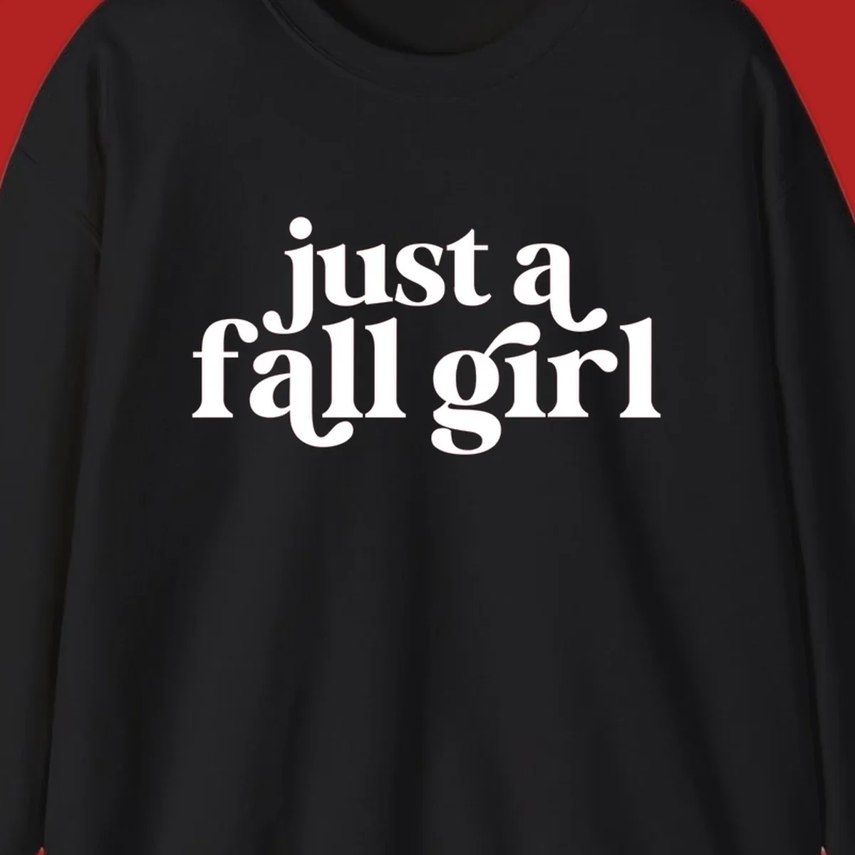 Just a Fall Girl typography design in white.