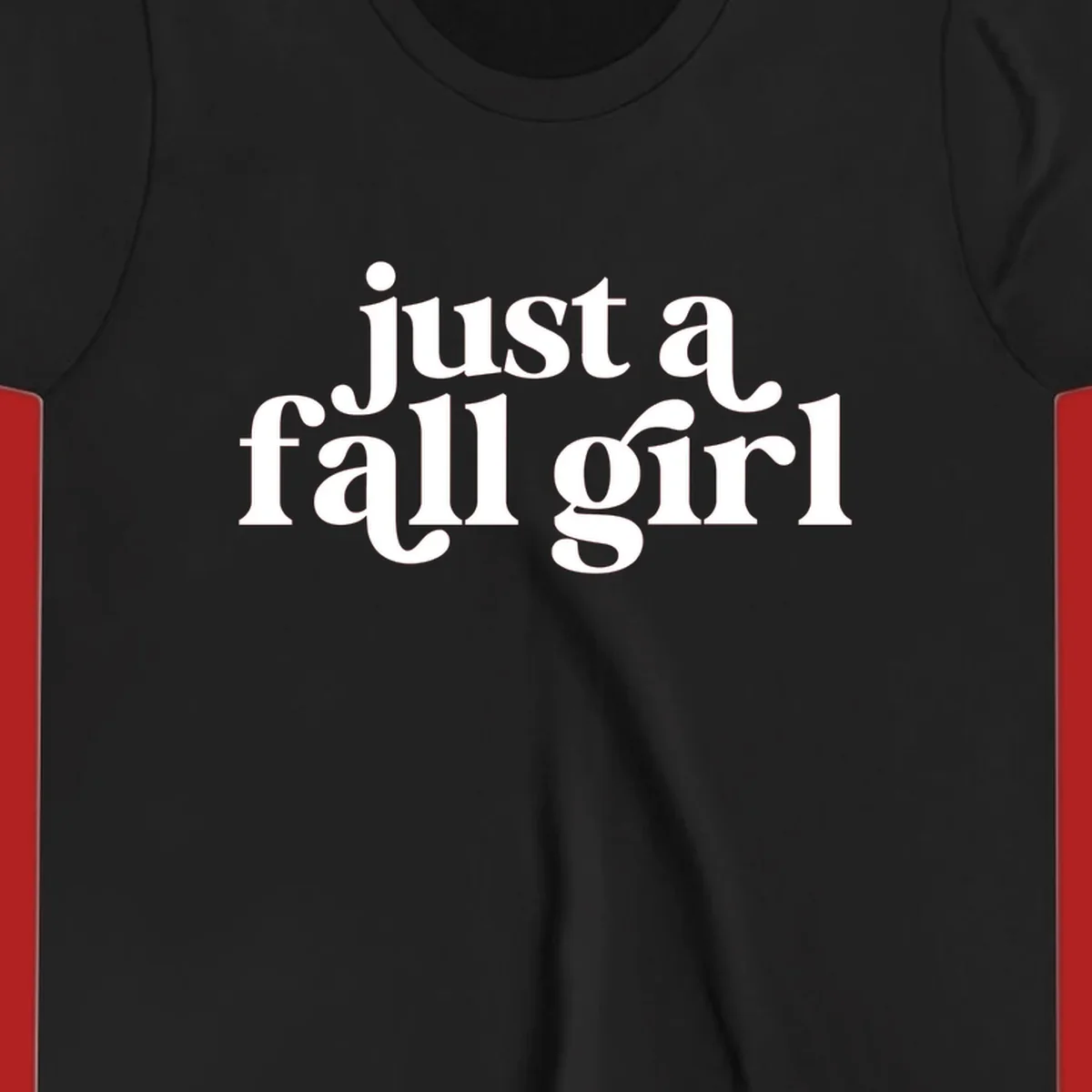 Just a Fall Girl typography design in white.
