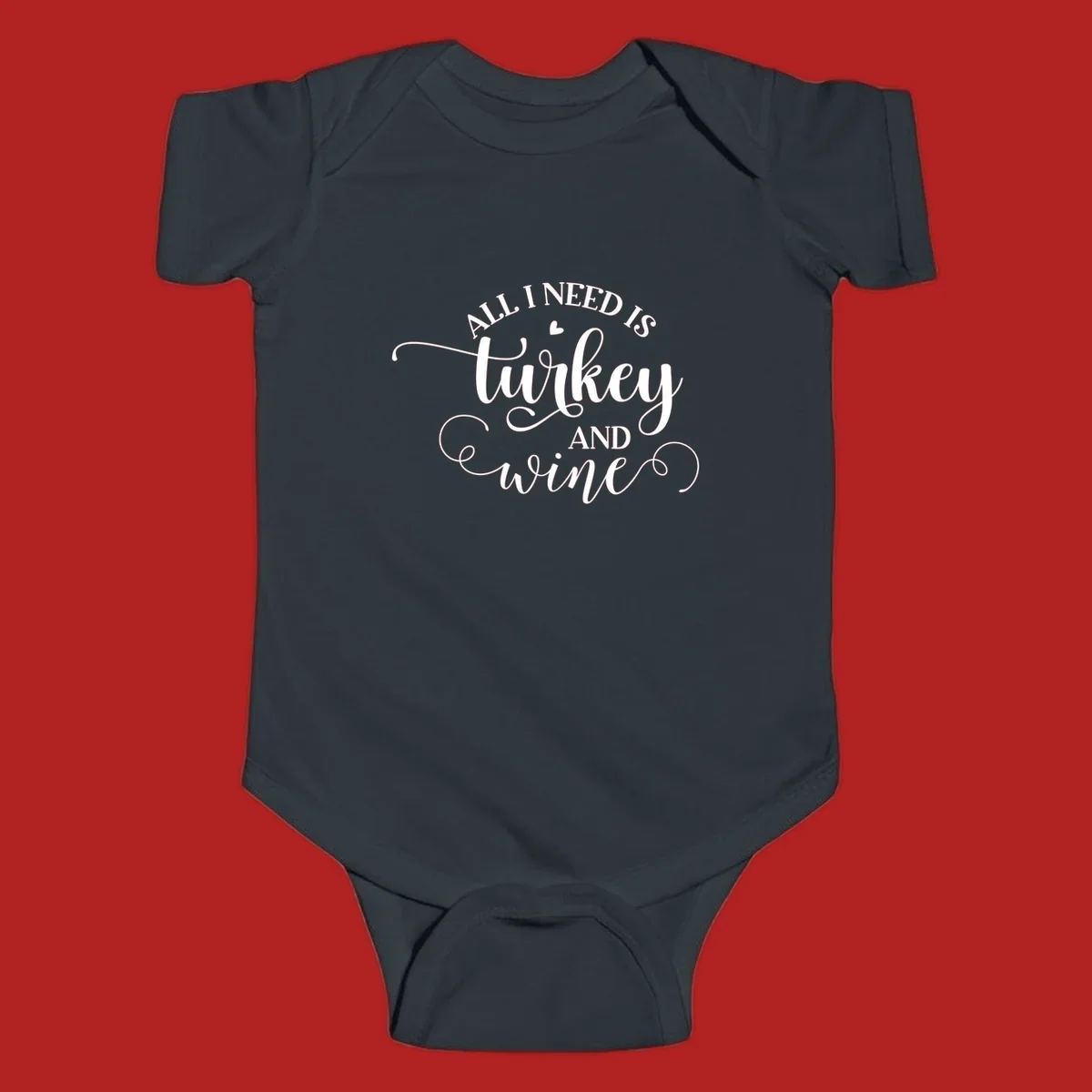 Typography design with text All I Need Is Turkey And Wine, featuring a small heart.
