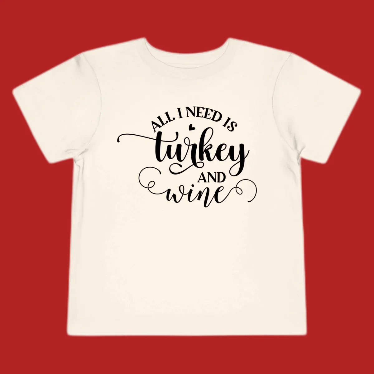 Typography design with text All I Need Is Turkey And Wine, featuring a small heart.
