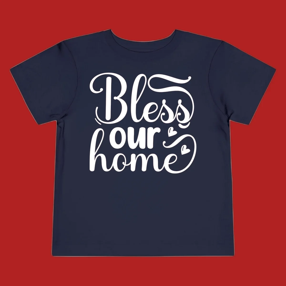 Bless our home script typography with hearts. White text on black and white backgrounds.