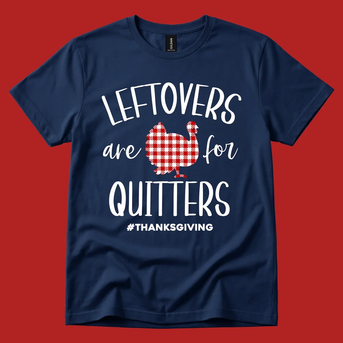 Leftovers are for quitters thanksgiving turkey graphic tee. White text, red and white gingham turkey.