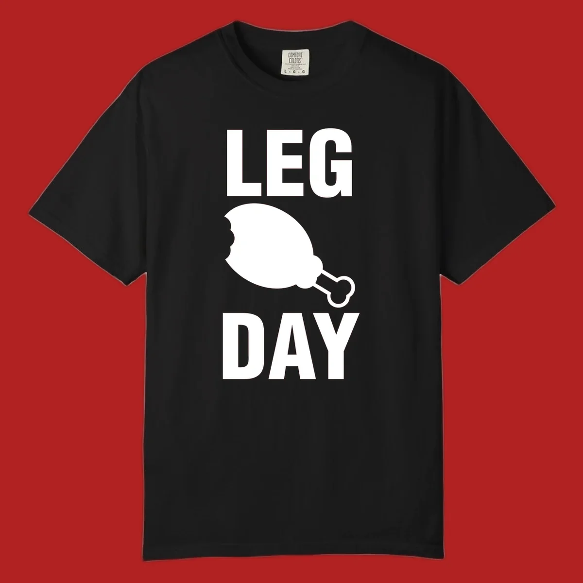 Bold text LEG DAY with a bitten chicken leg graphic in between.