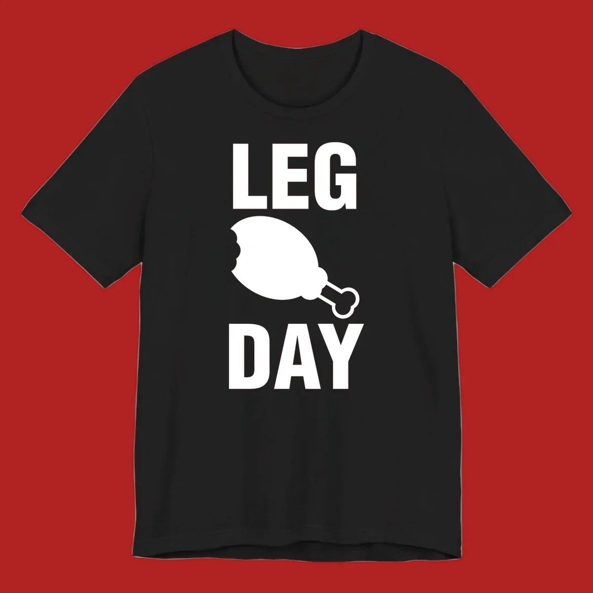 Bold text LEG DAY with a bitten chicken leg graphic in between.