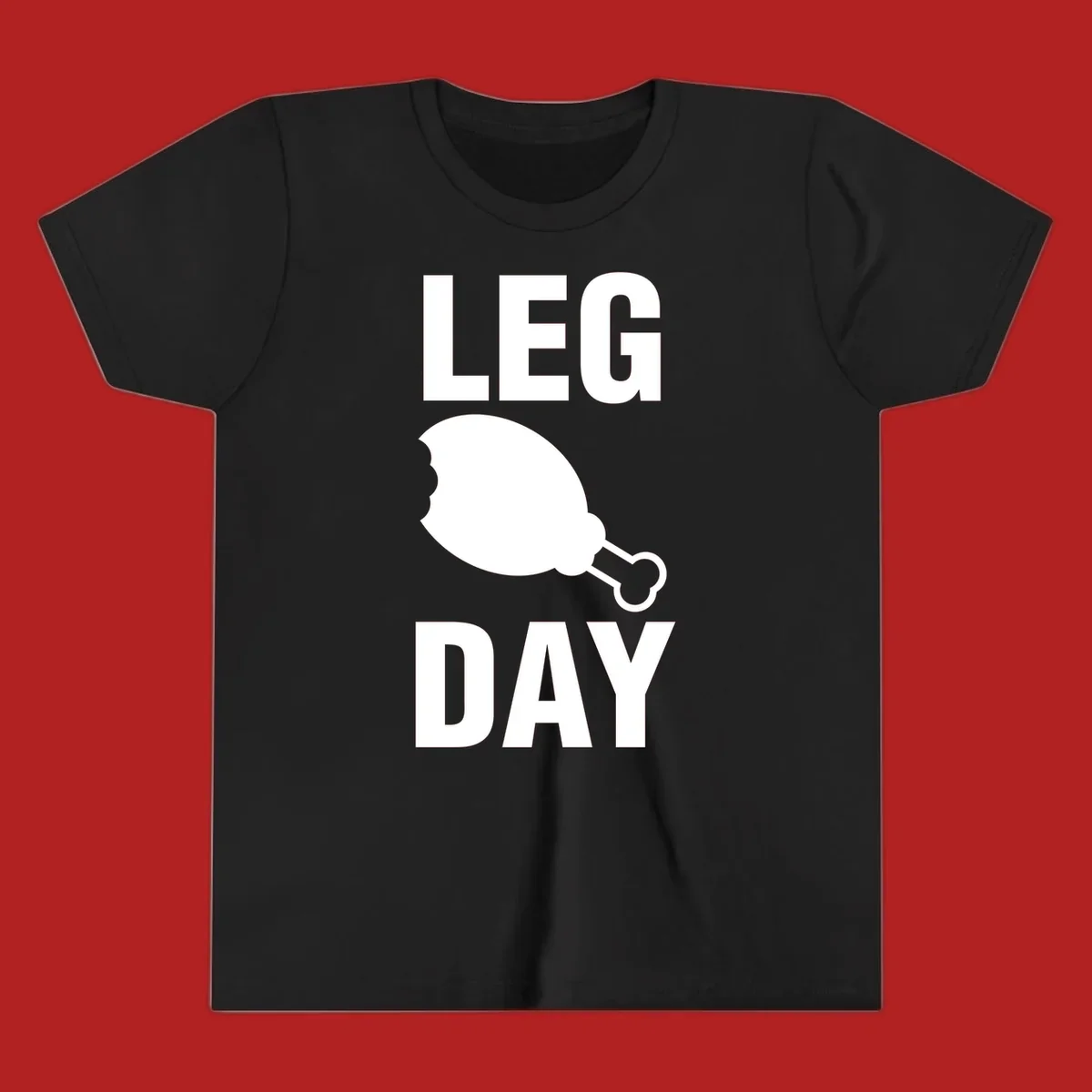 Bold text LEG DAY with a bitten chicken leg graphic in between.