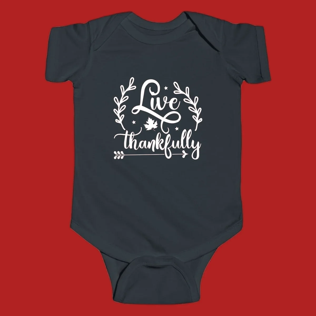 Live thankfully fall design with script text, leaves, and stars.