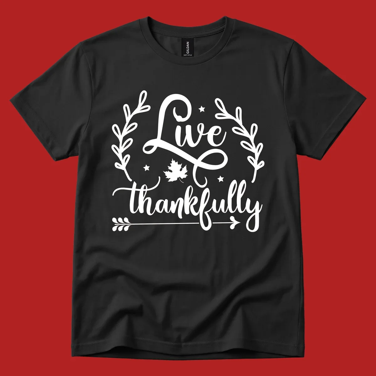 Live thankfully fall design with script text, leaves, and stars.