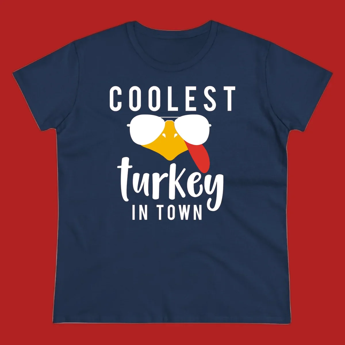 Coolest Turkey In Town Thanksgiving design with a cartoon turkey wearing sunglasses and sticking its tongue out.