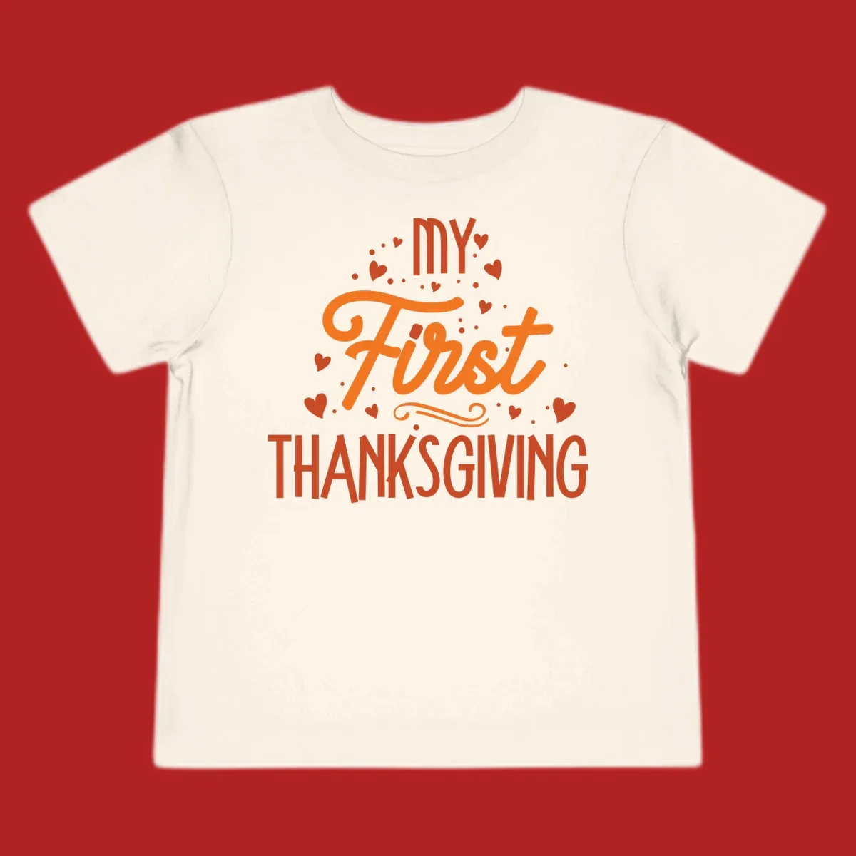 My First Thanksgiving text with hearts and dots illustration, for baby's first holiday.