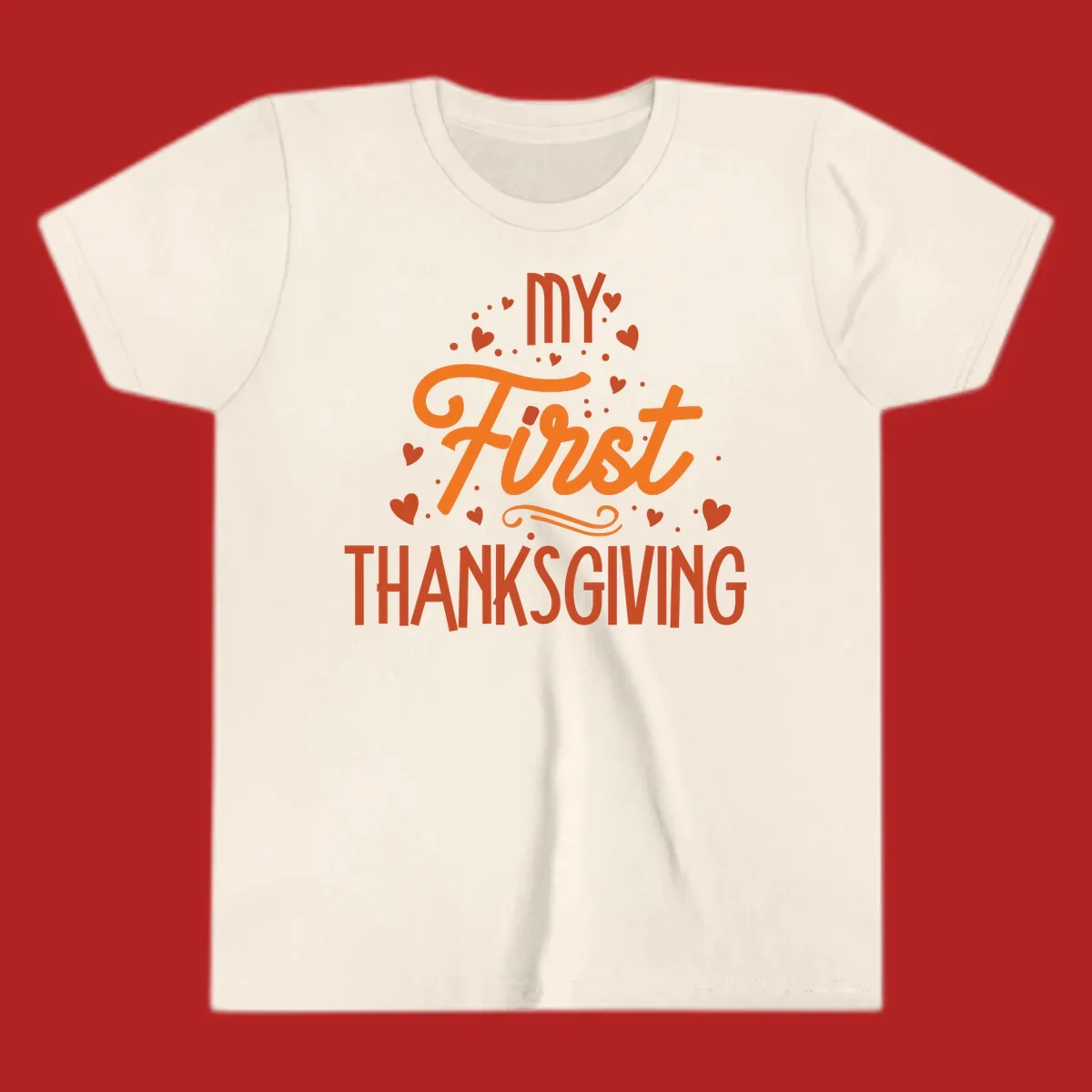 My First Thanksgiving text with hearts and dots illustration, for baby's first holiday.