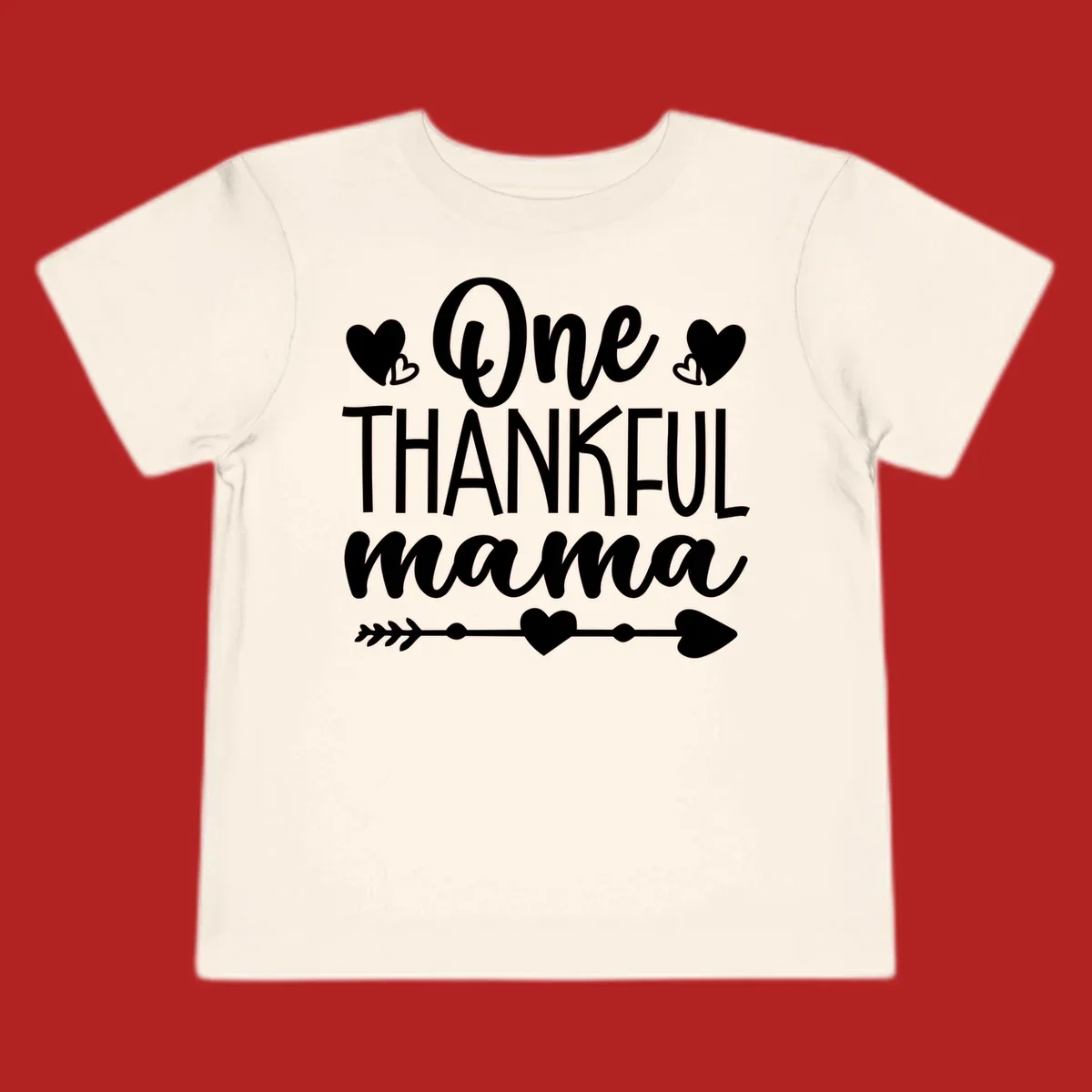 Typography design with hearts and an arrow that says "One THANKFUL mama".