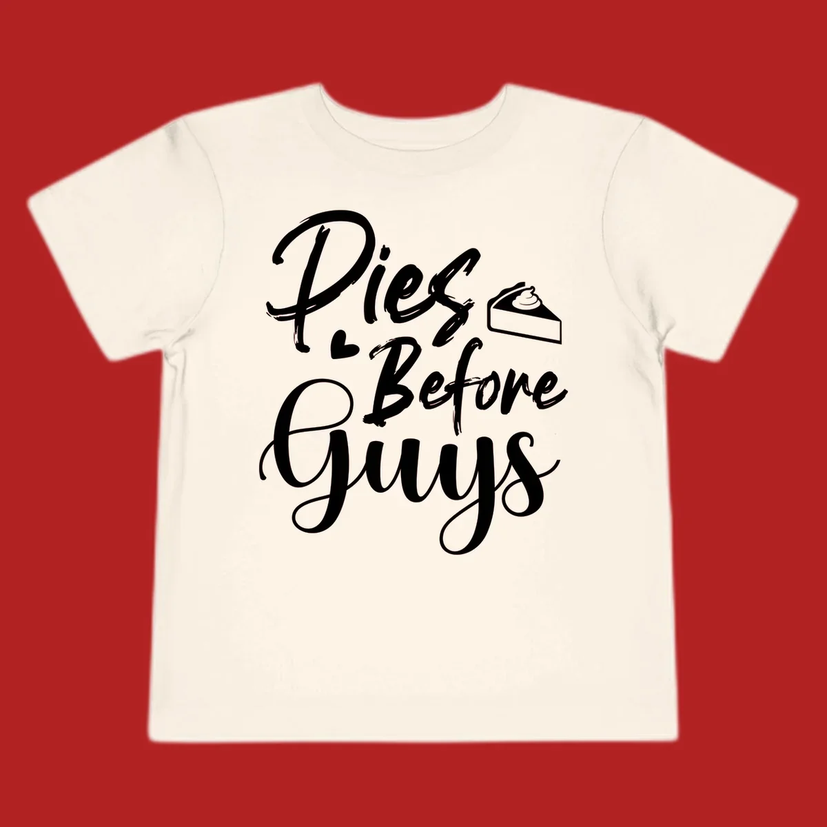 Pies Before Guys typography design with heart and pie slice.