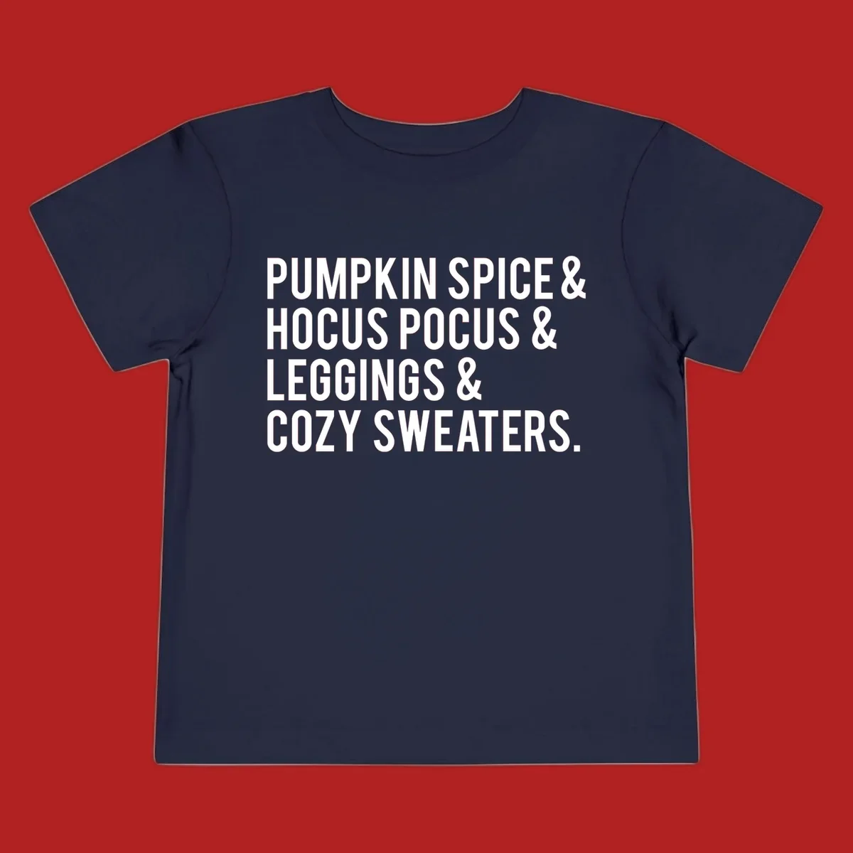 Bold white text listing fall favorites: pumpkin spice, hocus pocus, leggings, cozy sweaters.