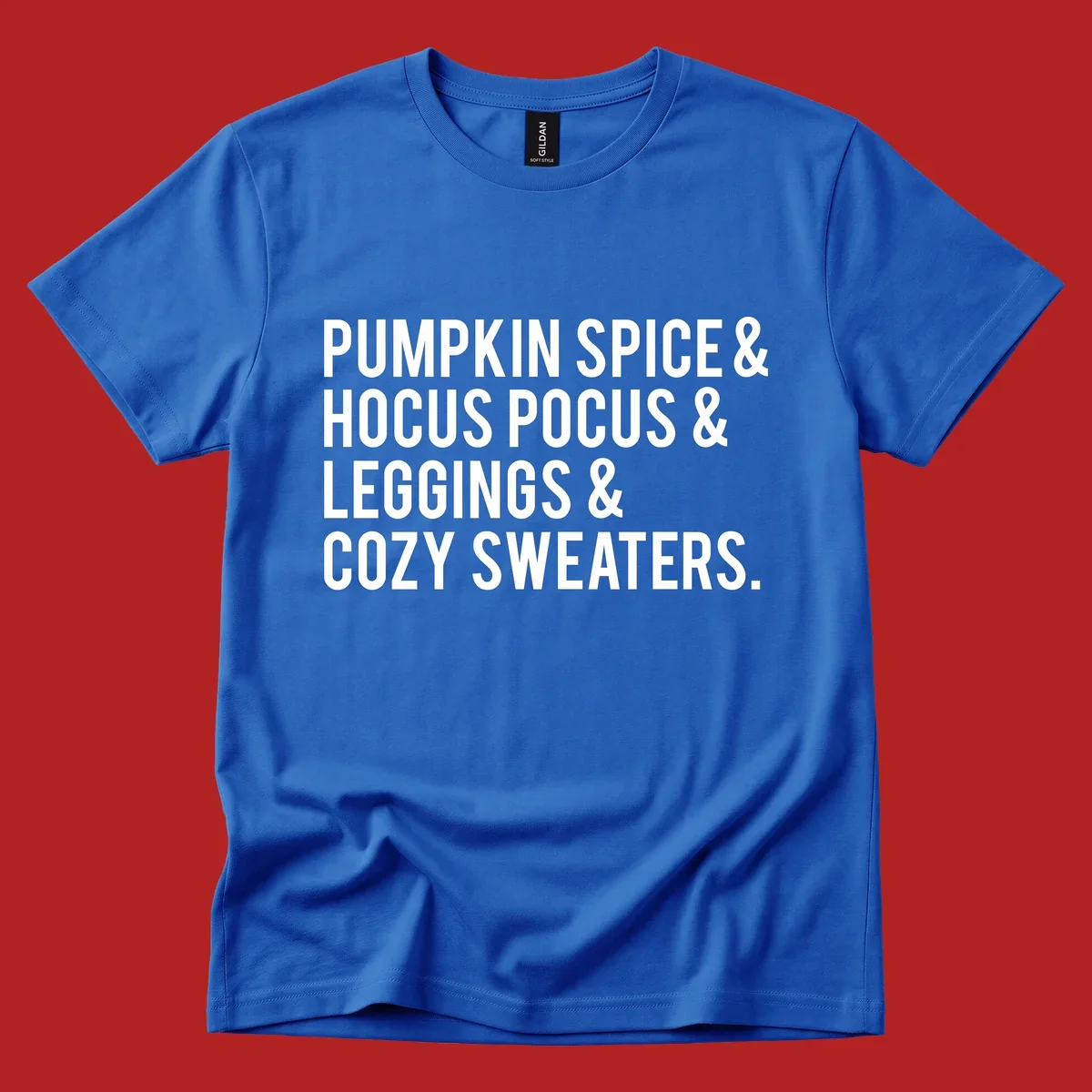 Bold white text listing fall favorites: pumpkin spice, hocus pocus, leggings, cozy sweaters.