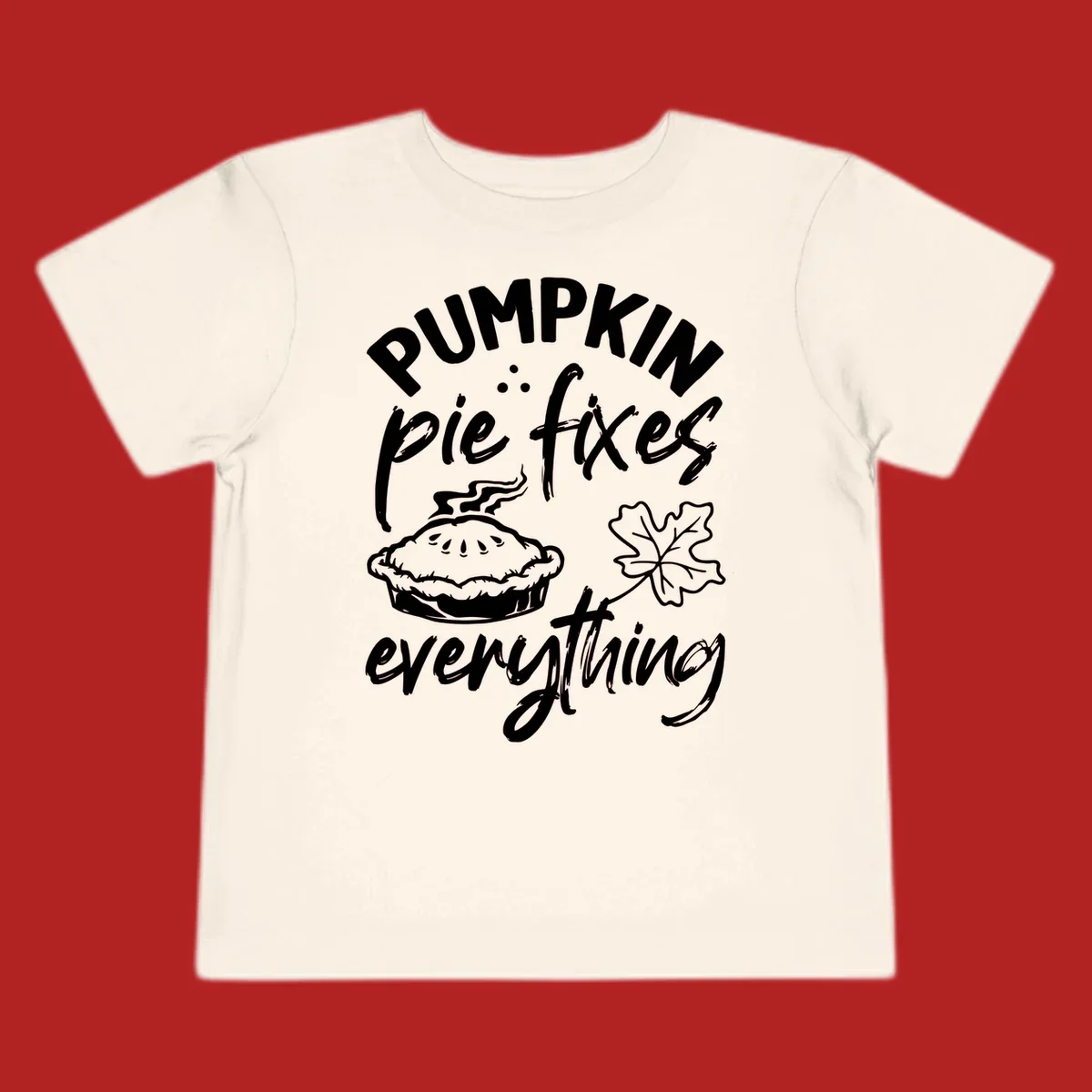 Text and illustrations of pumpkin pie and a maple leaf with the phrase "Pumpkin Pie Fixes Everything".