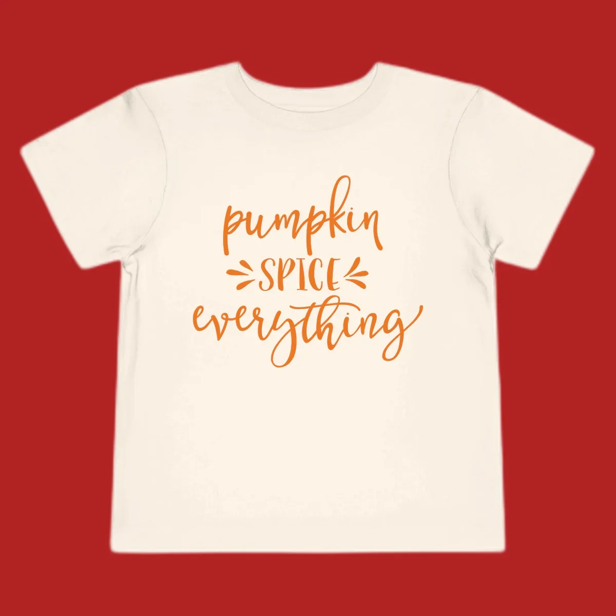 Pumpkin Spice Everything text design in orange script font, celebrating fall.