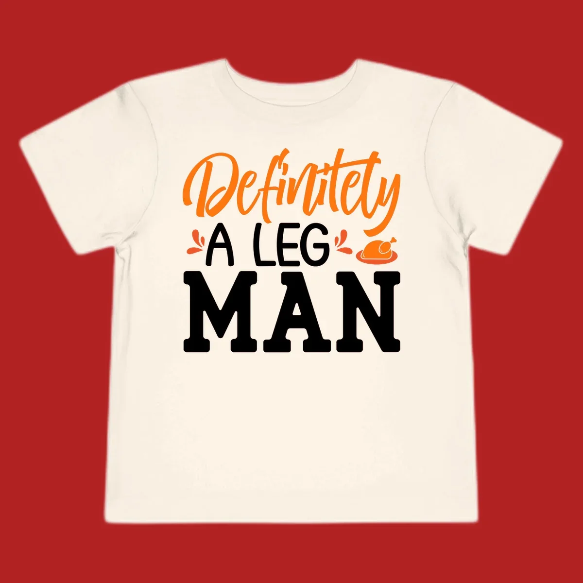 Thanksgiving Leg Man typography design with a roasted turkey illustration. Orange and white text on black.