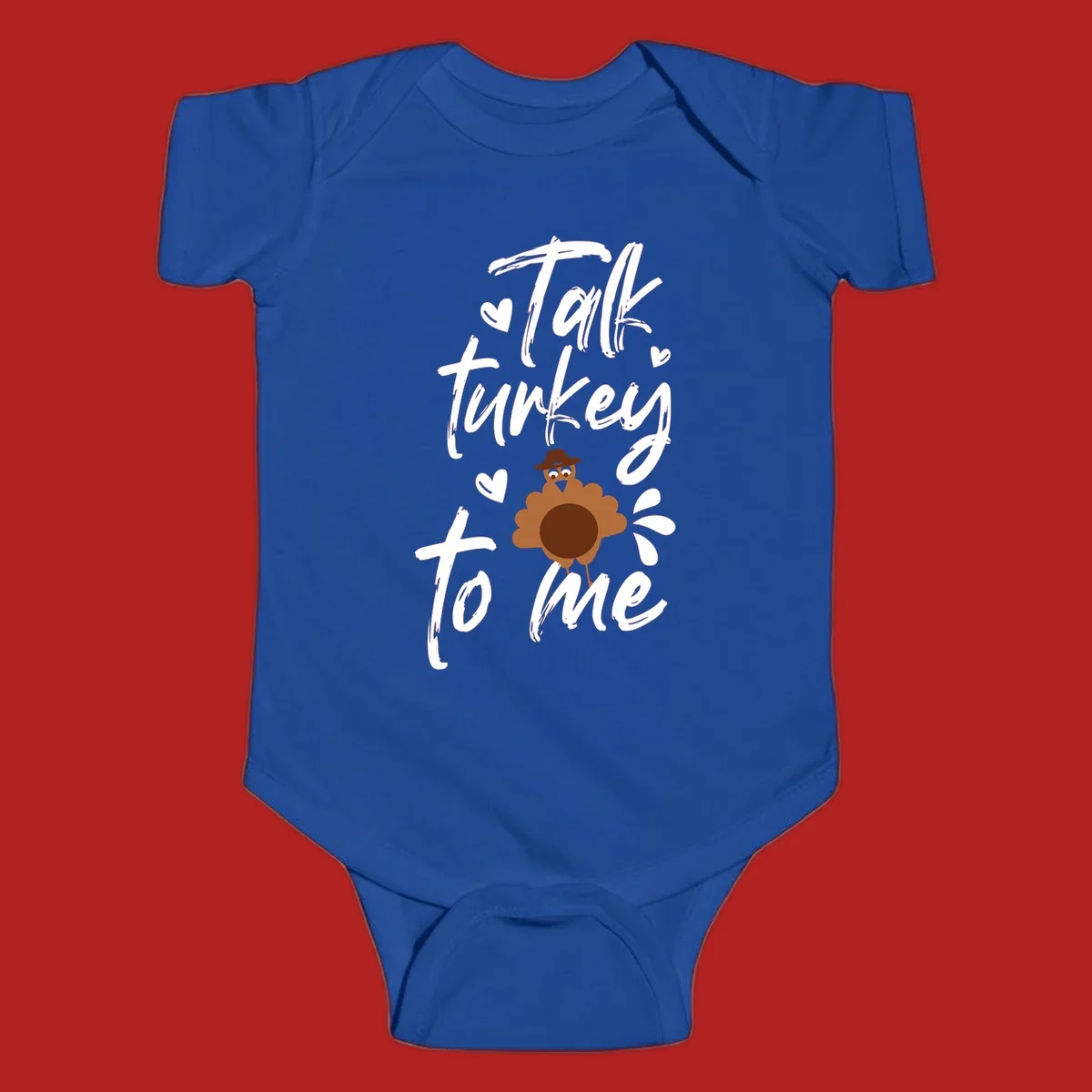 Talk turkey to me Thanksgiving graphic with a cute turkey and hearts.