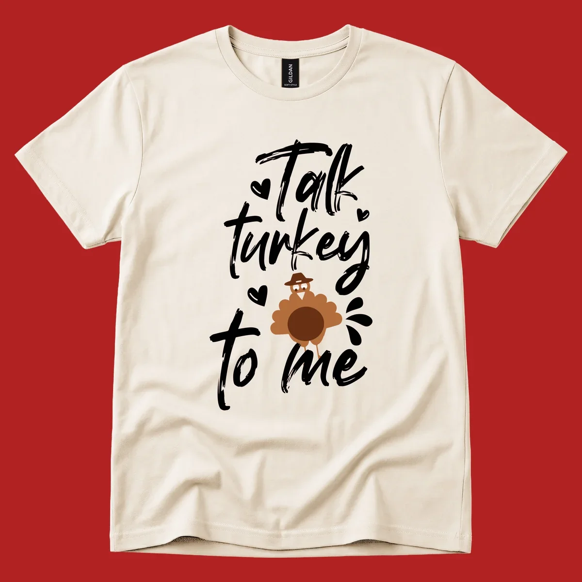 Talk turkey to me Thanksgiving graphic with a cute turkey and hearts.