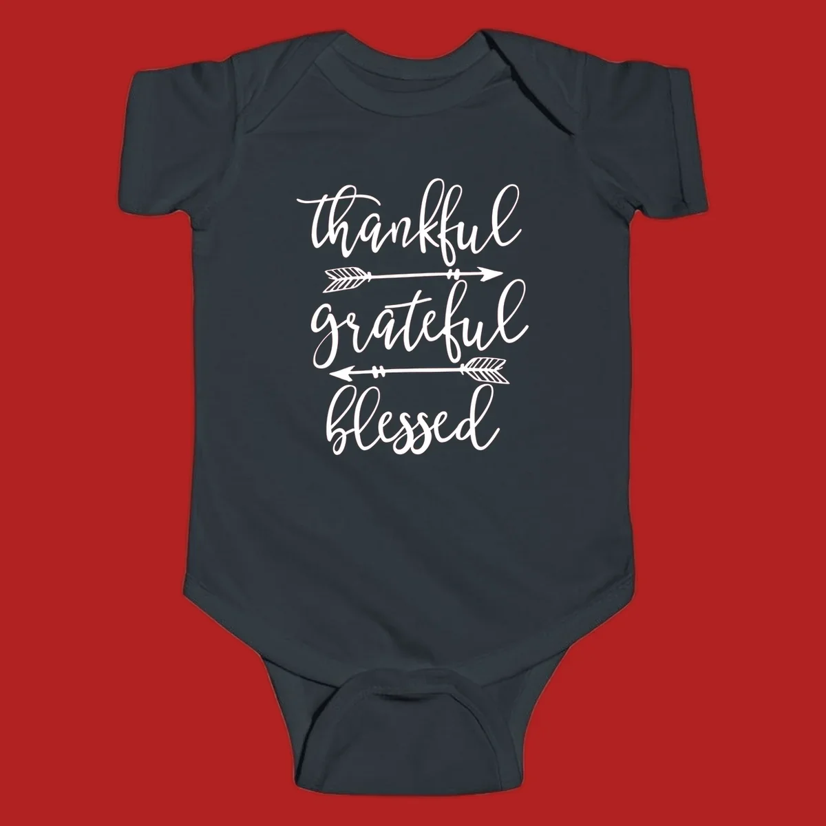 Thankful grateful blessed typography design with arrows on black and white backgrounds.