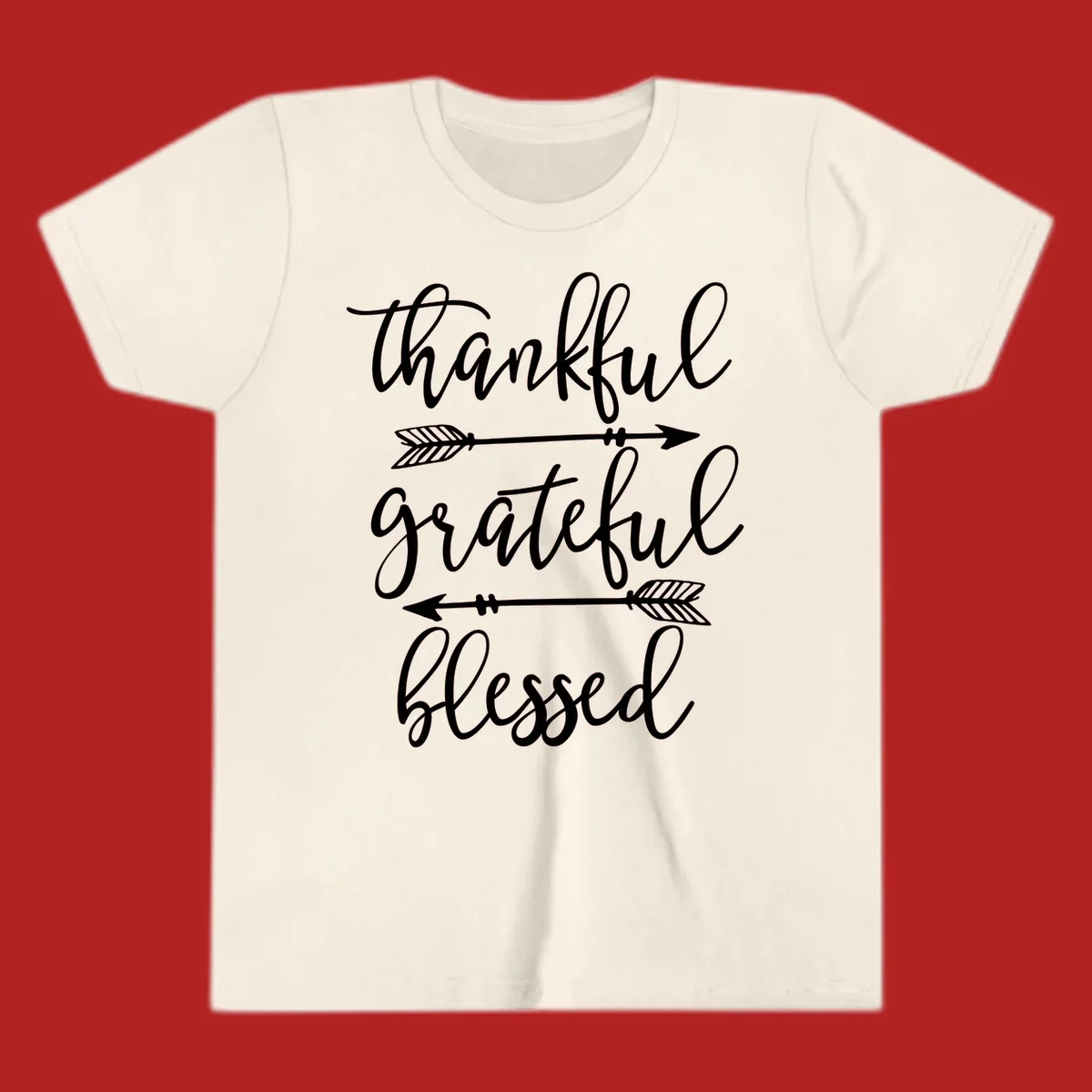 Thankful grateful blessed typography design with arrows on black and white backgrounds.