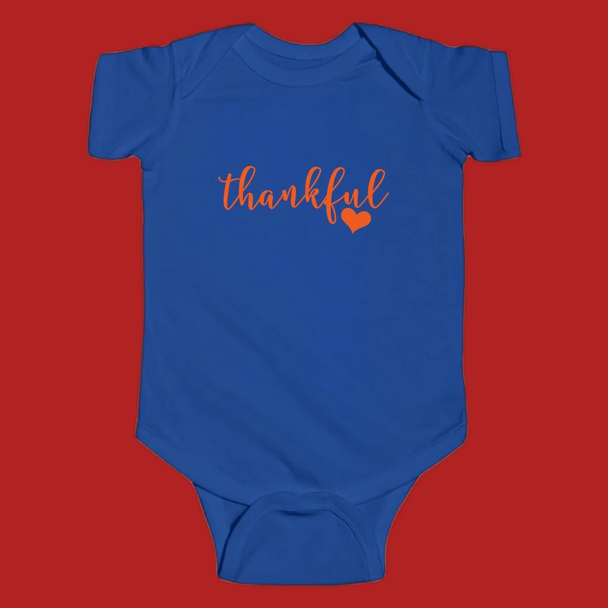Orange script text 'thankful' with a heart accent, thankful-heart-script.